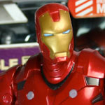 Collection of iron man comics and action figures