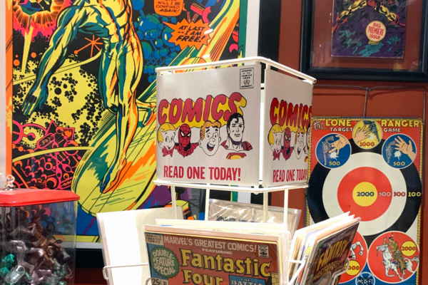 Comic spinner rack and Third Eye Silver Surfer poster
